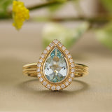 Pear Shape Aquamarine & Diamond Halo Ring